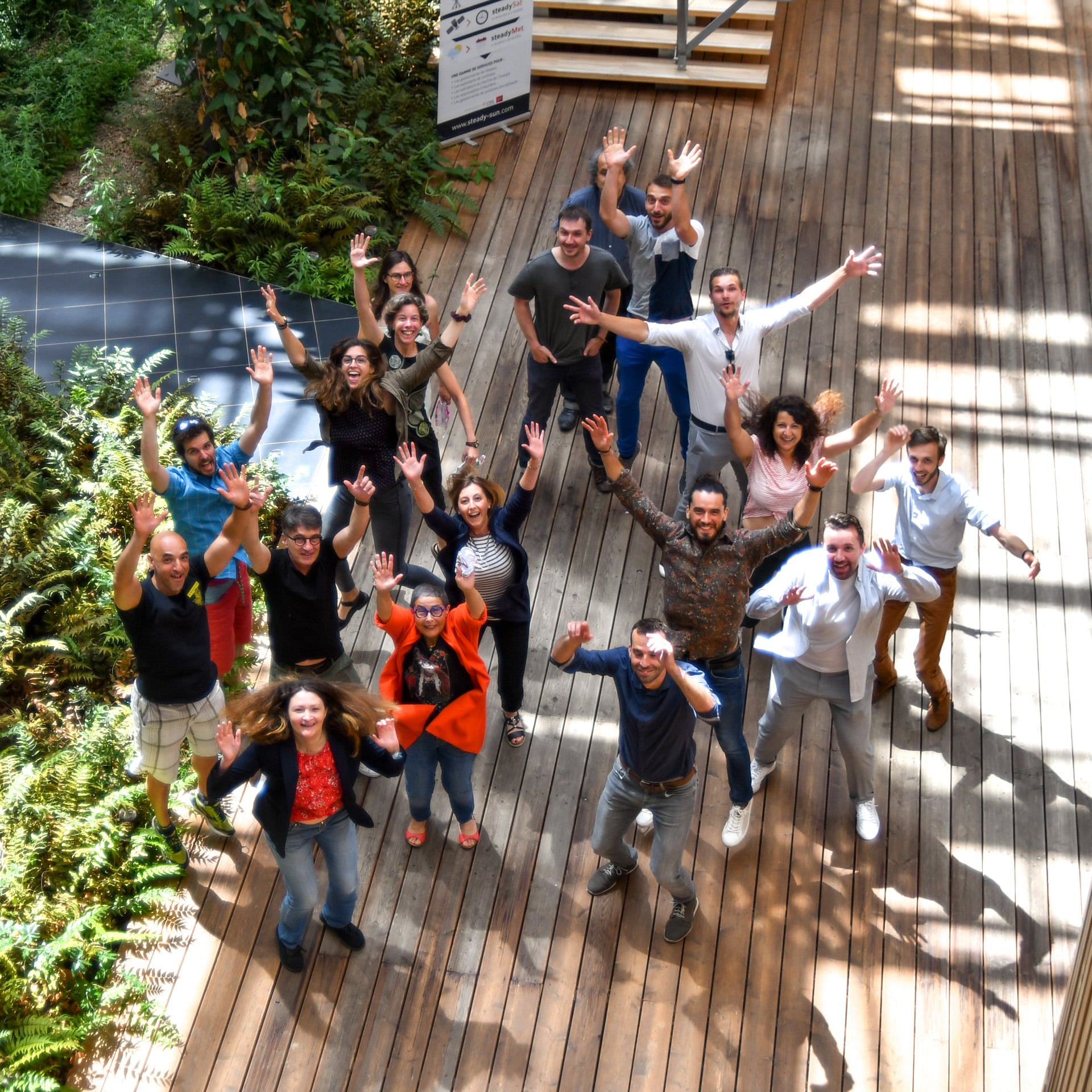 Steadysun team at INES – Overhead view with jumping members